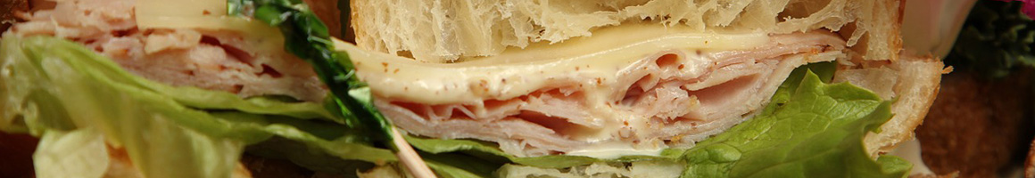 Eating Sandwich Cheesesteak at Lee's Hoagie House restaurant in Doylestown, PA.